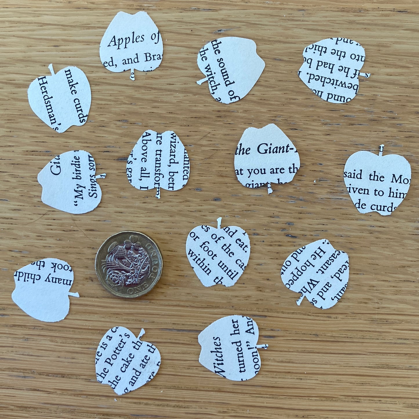 Apple embellishments on recycled folk tale book paper - 100 x die cut apples